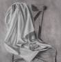 'Drapery on bordeaux chair', 2012. Charcoal on paper, 57 x 40 cm. Private collection.
